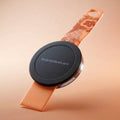 Back view of the orange Mo'bettah Airplane Phone Holder for MagSafe compatible iPhone